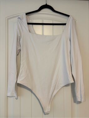Babaton Long Sleeve White One-Piece Bodysuit